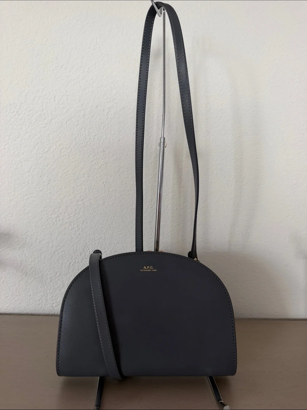 A.P.C. Half-Moon Leather Crossbody Bag in Black with Gold Logo